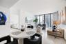 Neutral-toned tile flooring, floor-to-ceiling glass wall, and modern high-contrast aesthetic