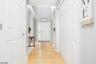 FRONT FOYER W/HARDWOOD FLOORS