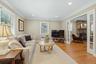 A relaxed sitting area tucked alongside the dining room.