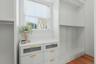 His-and-her walk-in closets, thoughtfully tucked behind pocket doors.