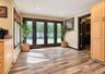 kitchen eating area, peek into utility room