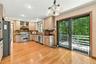 Kitchen with Sliding Door to Wrap Around Balcony