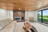 Lower Level Living Space with Fireplace and Separate Entrance to Yard
