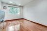Bedroom with wood floors