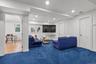 Finish Lower Level with Media Room, Powder Room, Storage Closets and Access to Garage