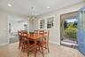 Kitchen Eat-In Area w Radiant Floors and Door to Rear Porch