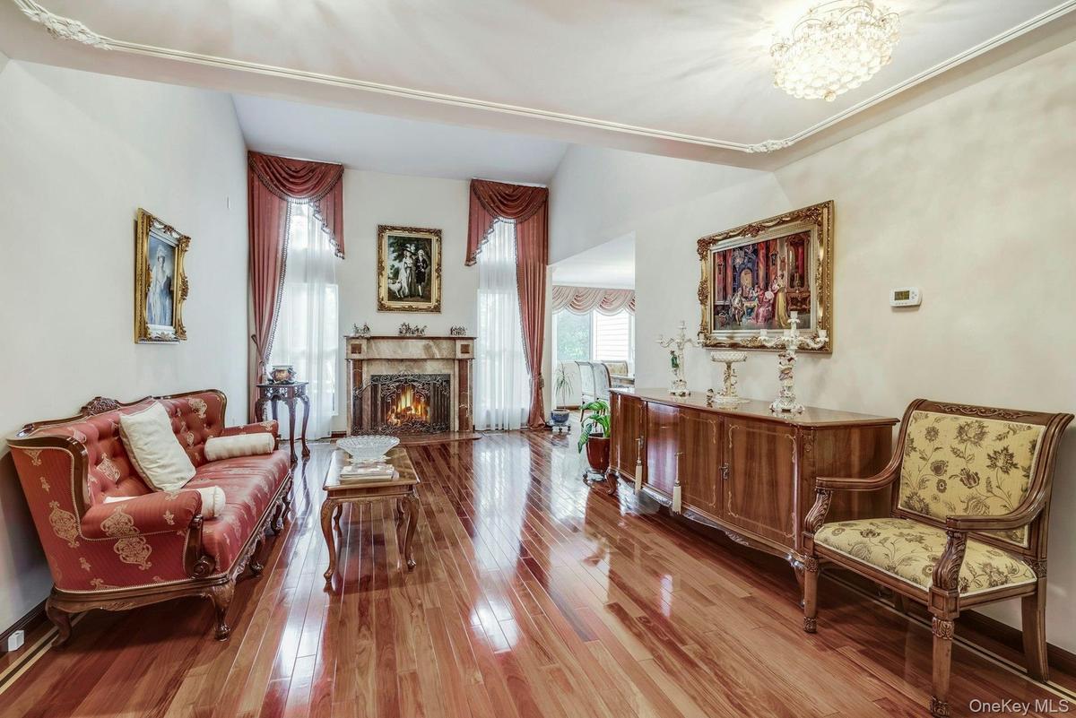 Living room with wood burning fireplace