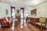 Living room with wood burning fireplace