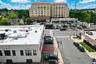 View of parking space from balcony. Deli on corner has all of your grocery needs!