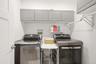 Laundry room on floor with bedrooms