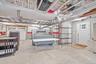 Overhead storage racks and wall mounted storage cabinets