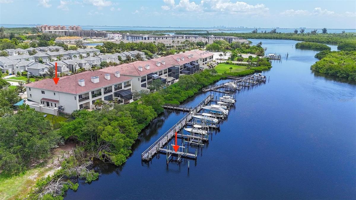 Exceptional luxury waterfront home with private pool, boat slip with 13,000 lb boat lift and Gulf access.