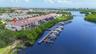 Exceptional luxury waterfront home with private pool, boat slip with 13,000 lb boat lift and Gulf access.