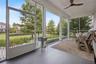 Welcoming screened porch overlooking park!