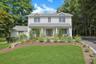 Beautiful curb appeal! welcomes you home, complete with a charming front porch, the perfect spot to enjoy your morning coffee and star the day in a pe