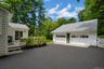 View of the deck and this large driveway!