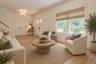 Beautifully virtually furniture staged to showcase this bright, inviting living room !