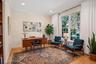 Virtually staged room. first floor Library is perfect as a first floor bedroom. There is a full bath on the same level.