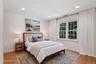 Bedroom #1 virtual staging. With a private ensuite.