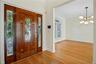 High ceilings and expansive windows fill the space with natural light.