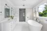 With two separate water closets.