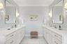 Gorgeous primary bathroom with double vanities