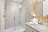 Full downstairs bathroom that services guests and the downstairs bedroom.