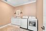 Lots of space to do laundry - could even put a desk in here!