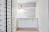 Lower level hidden wine room