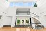Living room with stairway to the second floor