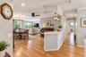 Hardwood flooring, recessed lighting, and crown molding