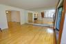 Living Room has a bay window, hardwood floors and opens to the dining room. Living room is approx 16'-6" x 14'-11"