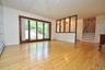 Living Room has a bay window, hardwood floors and opens to the dining room. Living room is approx 16'-6" x 14'-11"