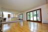 Living Room has a bay window, hardwood floors and opens to the dining room. Living room is approx 16'-6" x 14'-11"