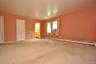 Large Primary Bedroom has wall to wall carpeting, two large closet and a private bath.  The room is approx. 16'-6" x 16'-2".
