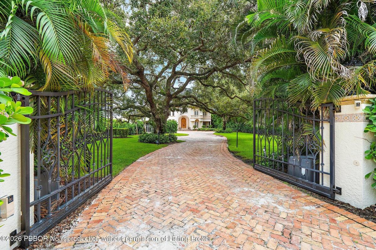 Privacy gates lead to the grand Intracoastal estate