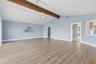 Great room with French doors to the primary bedroom