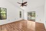 Generous primary bedroom with a comfortable layout, offering privacy and a quiet retreat within the home.
