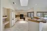 Spacious kitchen with skylight.
