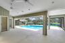 Large covered lanai, cabana bath overlooking the lake.