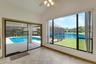 Pool and lake views from family room.