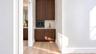 Wet bar for the primary bedroom, with virtual staging