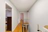 Hardwood flooring throughout the hallway