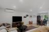 Family room with access to dining area and sliding doors to porch