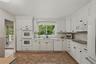 Kitchen with access to sliding doors to porch