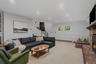Den with access to laundry, sun room and pool