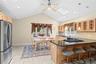 Vaulted ceiling with skylight and recessed lighting