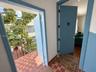 Main Entry to both Private Balcony (Left) and Apartment (Right) (AI edited photo)