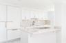 Open concept kitchen with granite countertops