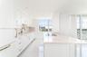 Open concept kitchen with granite countertops